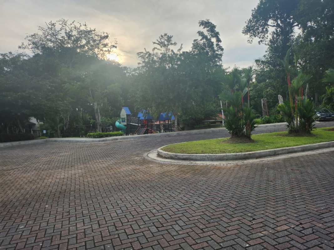 Children playground outdoor amenities green garden Senderos community Clayton Panama
