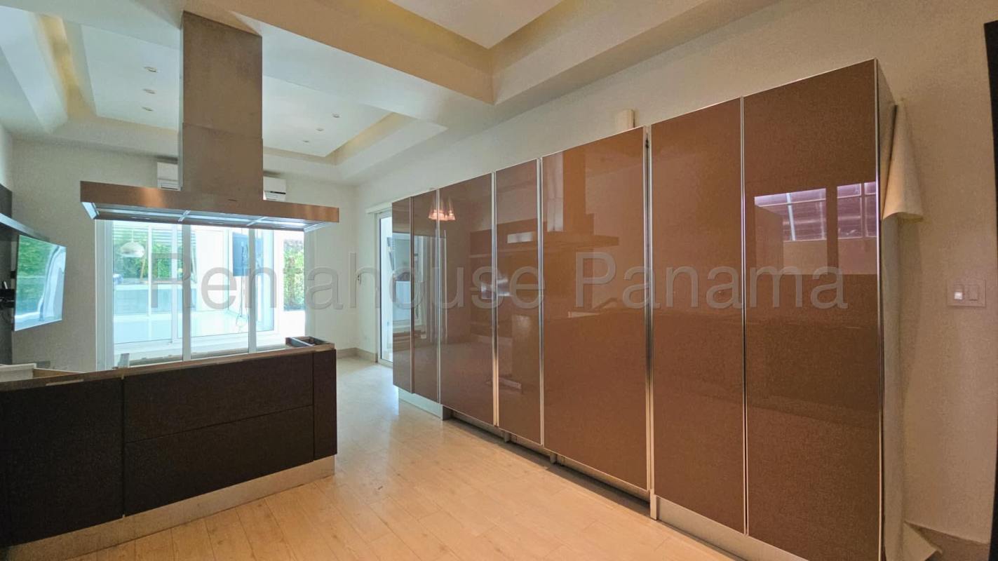 Luxury kitchen with built-in appliances and modern cabinetry at Costa del Este home Panama City