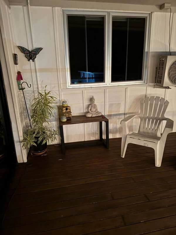 Furnished covered deck with tropical views in Clayton Park Residences Panama