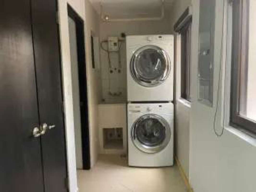 Open concept living dining area in Embassy Club apartment Clayton Panama