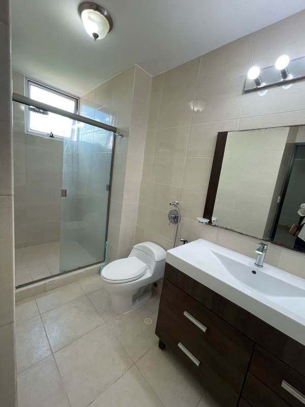 Remodeled bathroom with glass shower, granite vanity in PH Clayton Park Tower 1 Panama