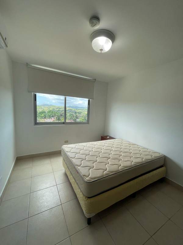 Bedroom with large windows, closet, AC and green views at PH Clayton Park Panama