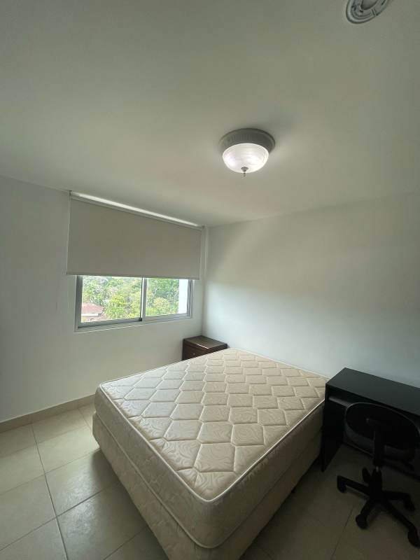 Minimalist bedroom with AC, natural light, and simple modern furnishing in PH Clayton Park