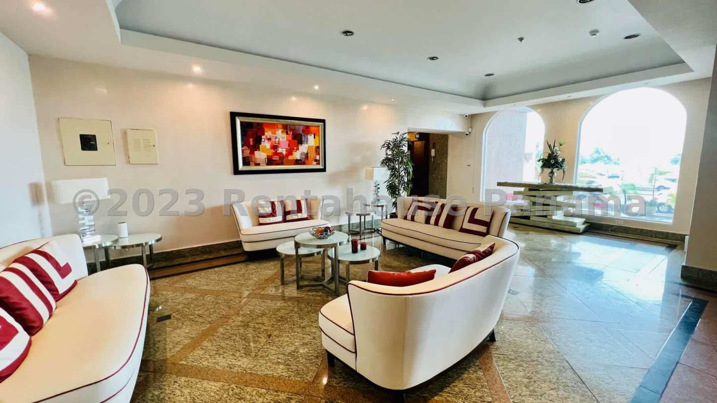 Open concept living dining with floor-to-ceiling glass and balcony access featuring ocean view in Avenida Balboa Panama