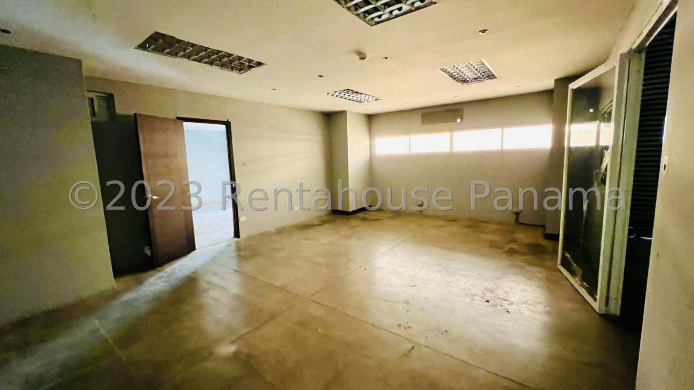 Spacious industrial warehouse interior with mezzanine office Tocumen