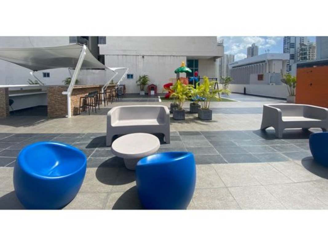 Colorful rooftop lounge area and children’s playground at PH Serenity San Francisco Panama