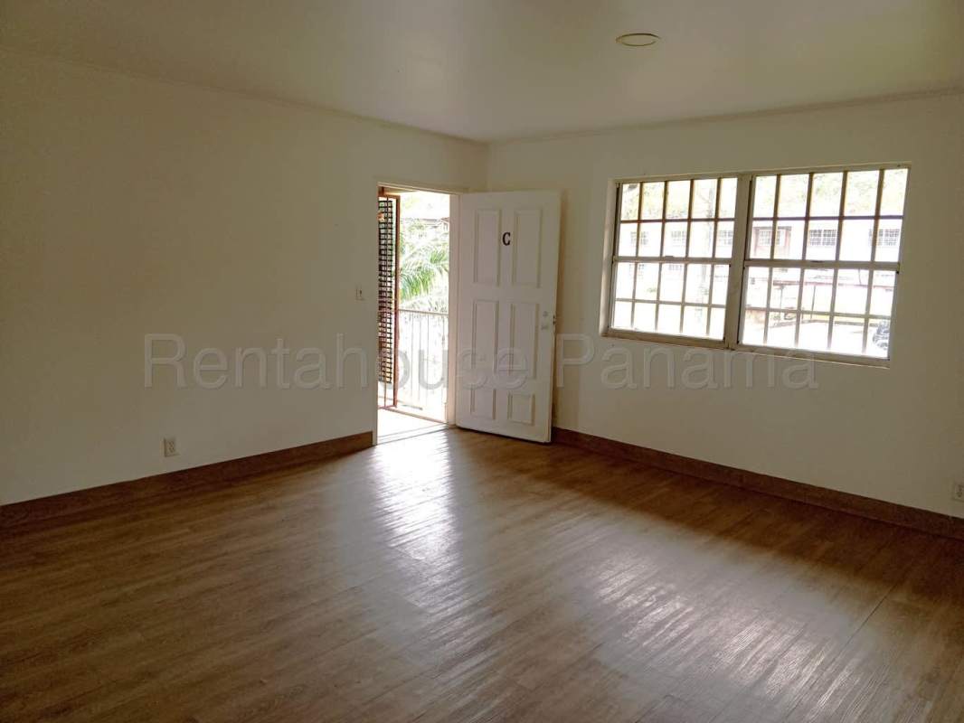 Bright living room with large windows and wood floors, PH Clayton Park Panama