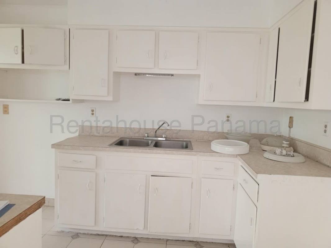 Spacious kitchen with white cabinets and double sink PH Clayton Park Clayton Panama