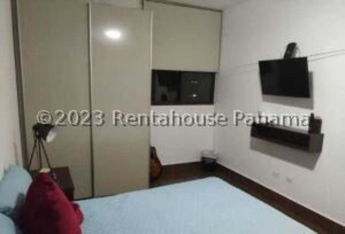 Modern ensuite bathroom with glass shower and granite vanity in PH Costamare Panama