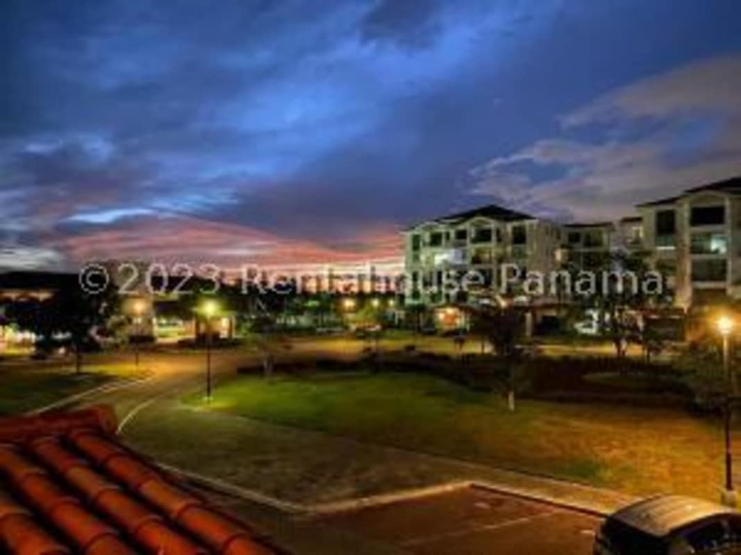 Modern kitchen with granite countertops and built-in appliances at PH Costamare Costa Sur Panama