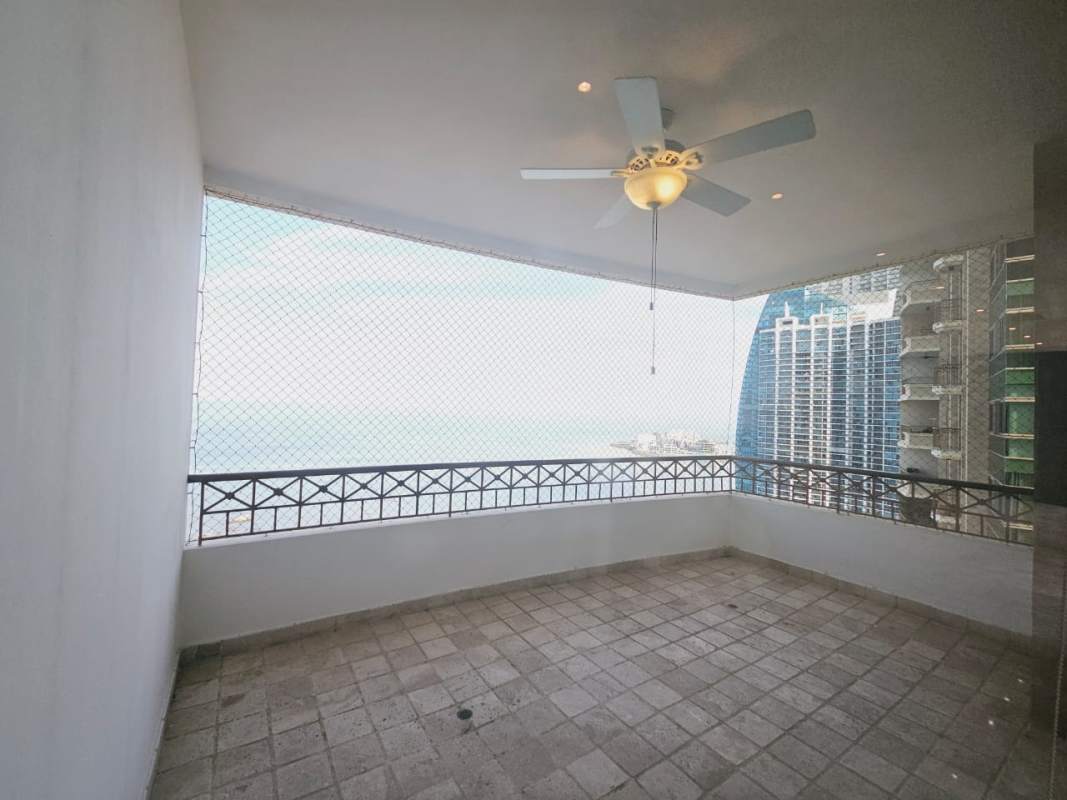 Gourmet kitchen with granite countertops, stainless steel appliances, large window city view Punta Pacifica