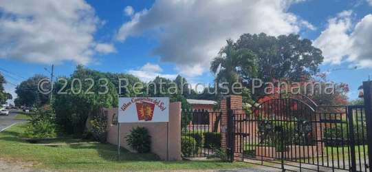 Bright Mediterranean living room with high vaulted ceiling, wicker furniture, pool access Punta Chame Panama