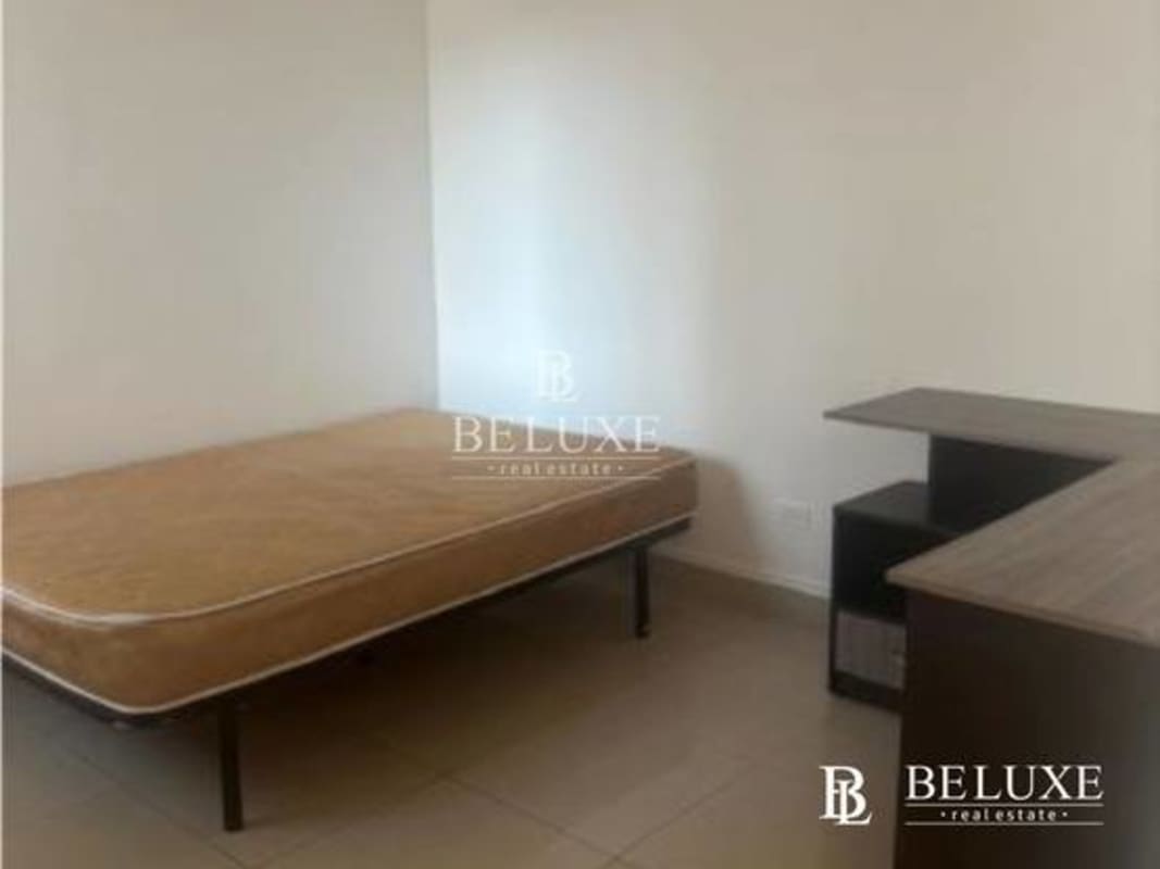 Second bedroom with closet and tiled floors in PH Sun City Albrook Panama City