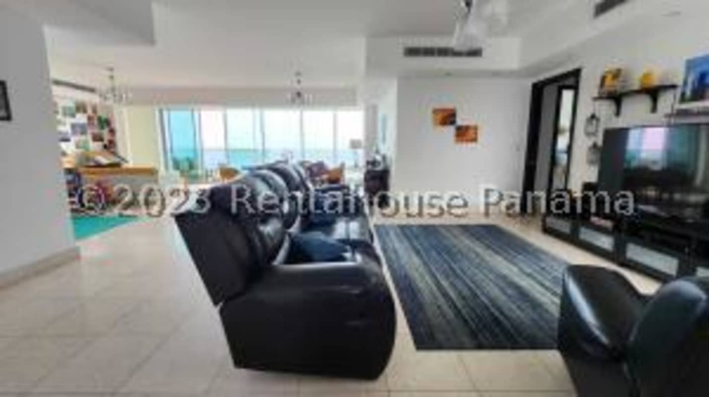 Spacious living dining room with ocean horizon windows in PH Ocean Two Costa del Este