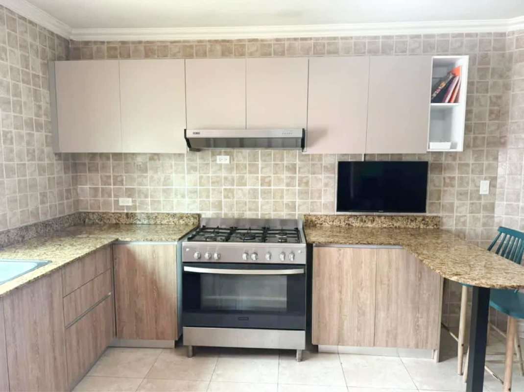 Granite kitchen countertops with wood cabinets in PH Mystic Point Panama City