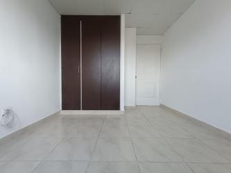 Modern bath with tiled walls, window, walk-in shower Costa Oeste house Panama