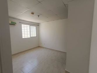 Bedroom with wardrobe, tiled floors, window in Costa Oeste rental house Panama