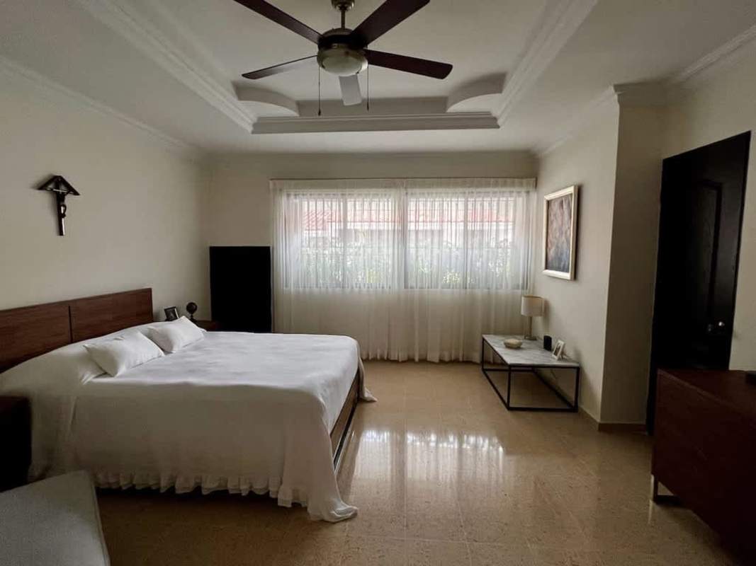 Exterior view of gated duplex townhouse community Residencial Los Flamingos in San Francisco Panama City