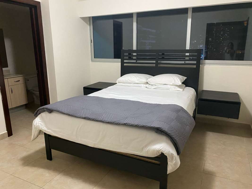 Furnished bedroom with ensuite bath and closet PH BICSA Tower