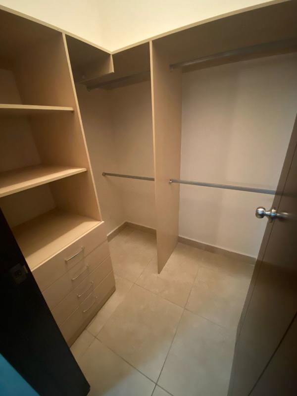 Spacious walk-in closet with built-in storage at PH BICSA Tower Avenida Balboa Panama City