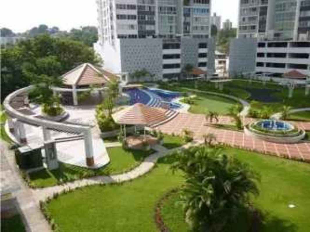 Swimming pool, gardens, gazebo and residential towers aerial in PH Central Park Tower Broadway Panama