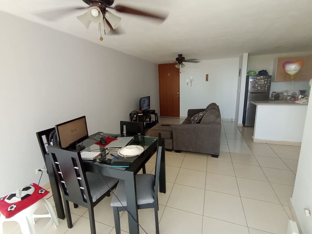 Living and dining area with ceramic tile floors and natural lighting in PH Central Park Tower Broadway