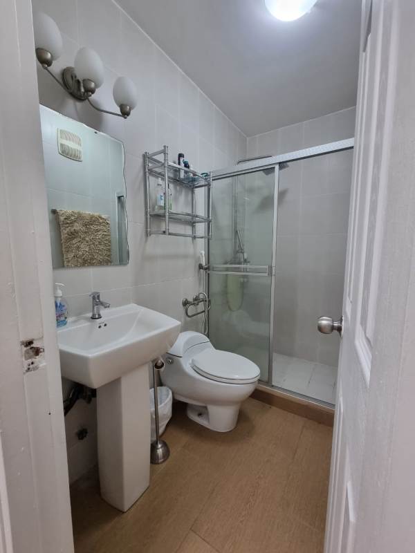 Contemporary bathroom with glass enclosed shower and vanity PH El Cangrejo Via Argentina Panama