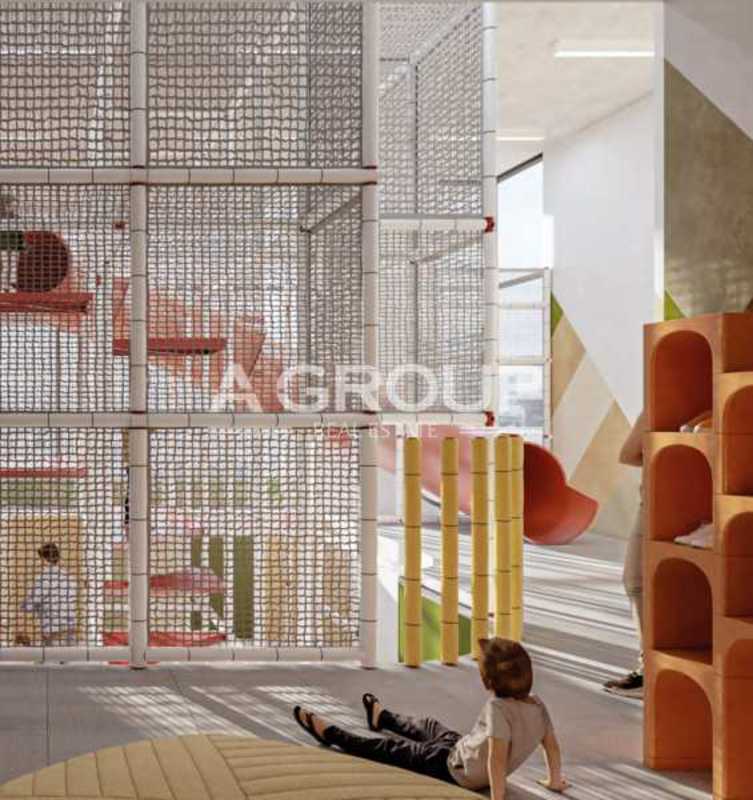 Colorful indoor children's playroom with slides in PH AquaPoint Punta Paitilla Panama