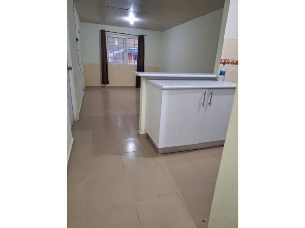 Large backyard patio space with laundry area in house for sale Las Cumbres Panama