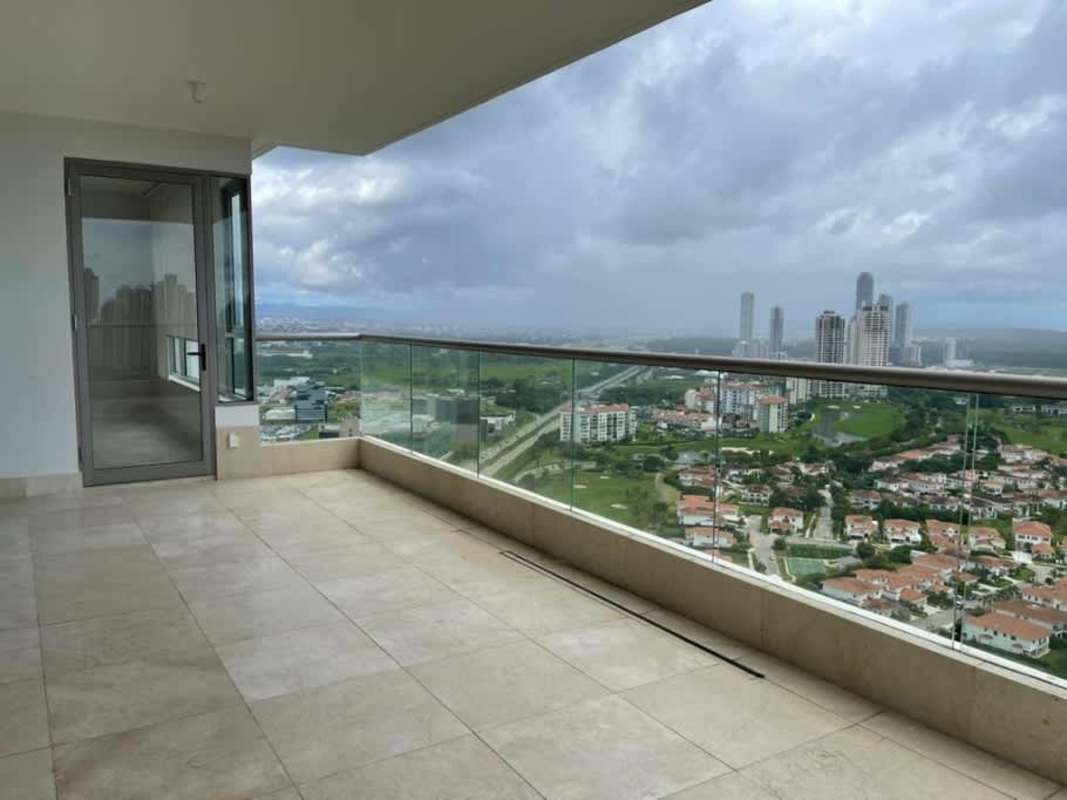 Bright living room with marble floors and panoramic city skyline view in Santa Maria Panama City