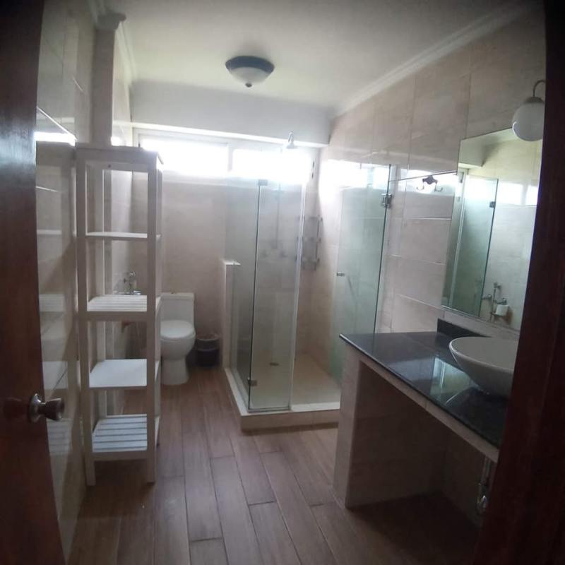 Contemporary bathroom with glass enclosed shower, granite countertop, vessel sink in PH Sandra La Cresta