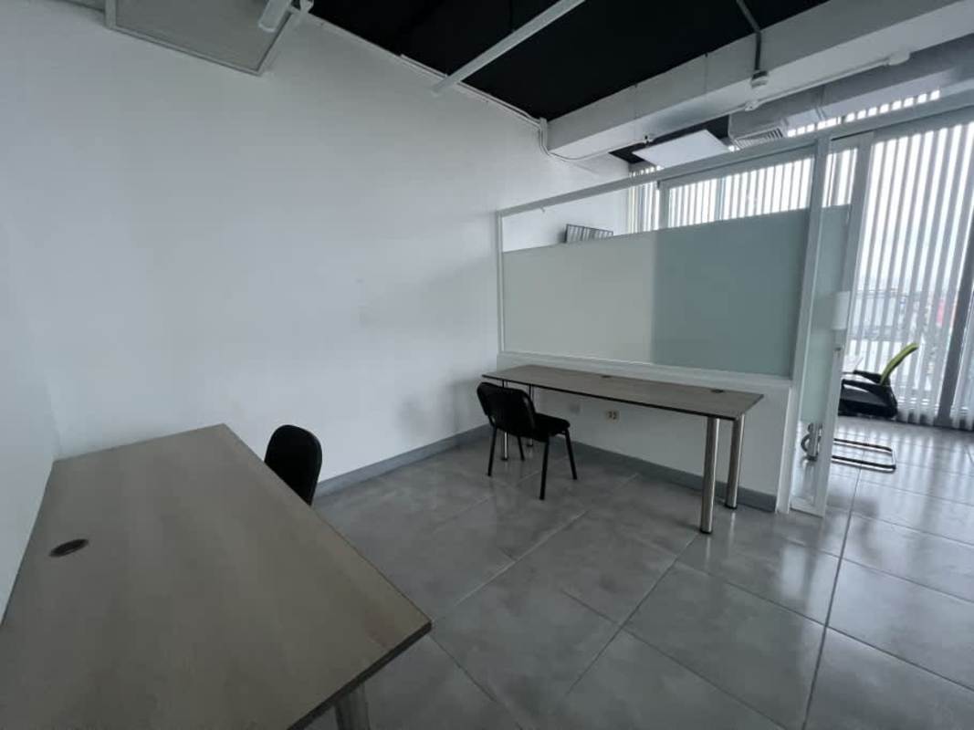 Minimalist workspace with vertical blinds PH BOC Tower Panama City