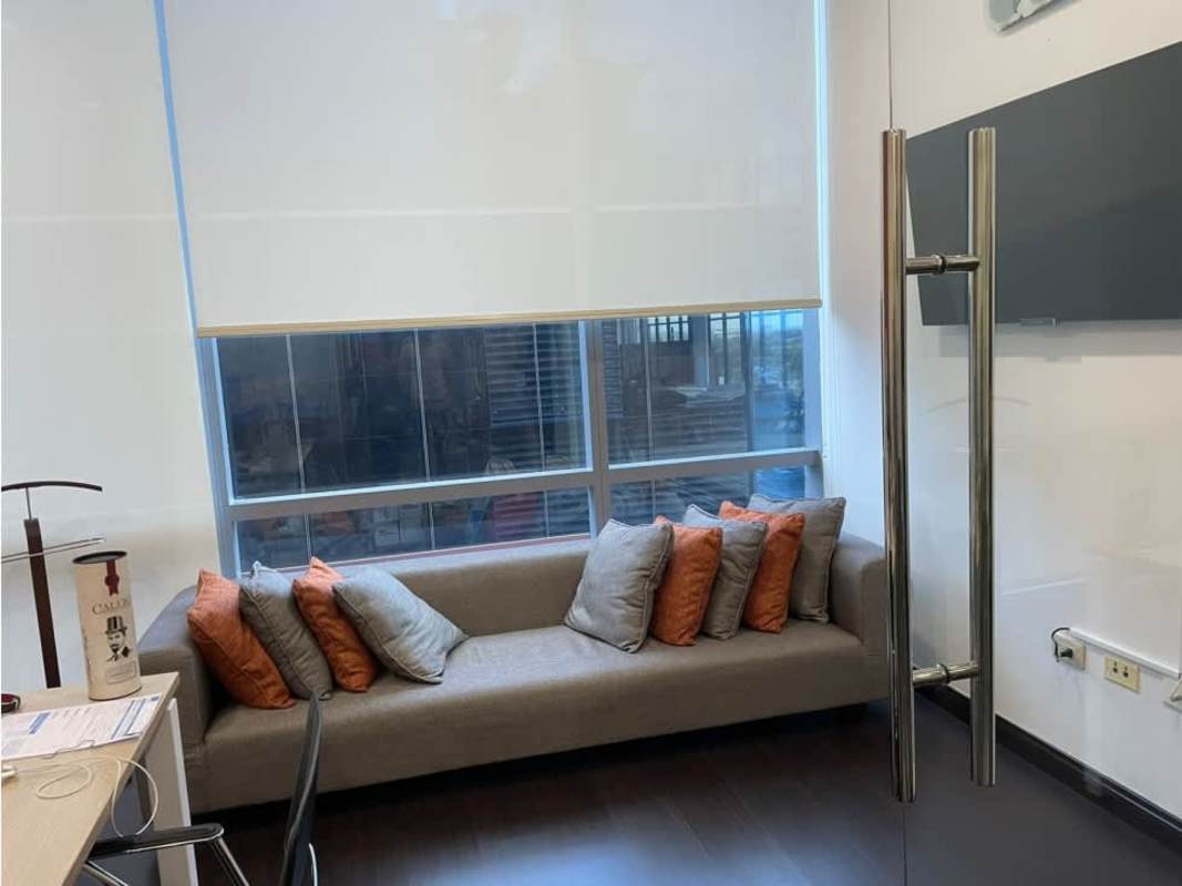 Furnished private offices with desks and glass partitions in Santa María Office Plex Panama