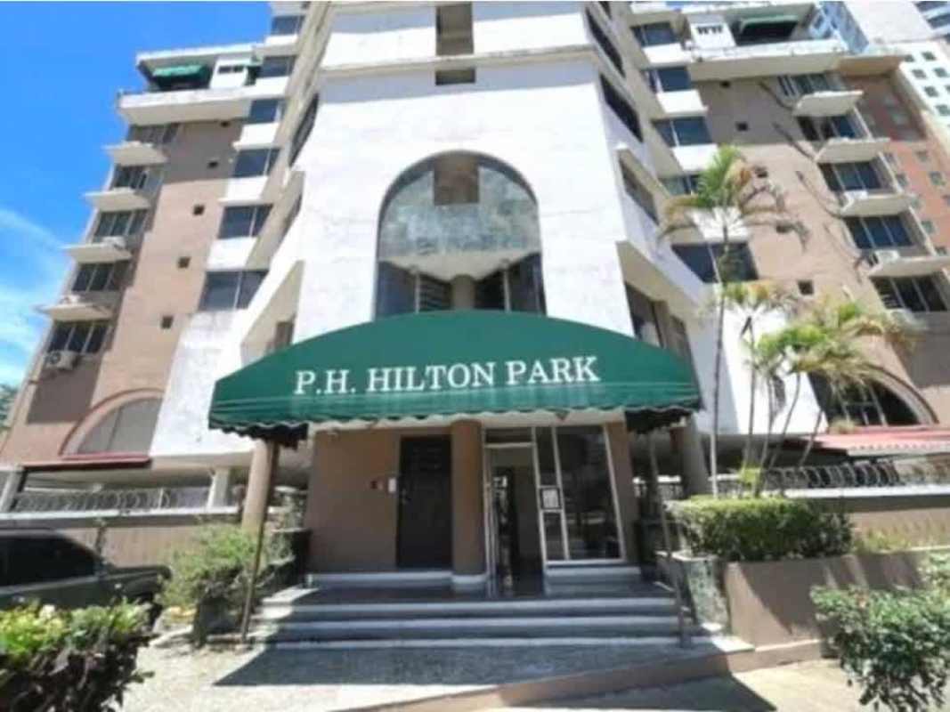 Street view of PH Hilton Park condominium building with balconies and entrance canopy in Bella Vista Panama City