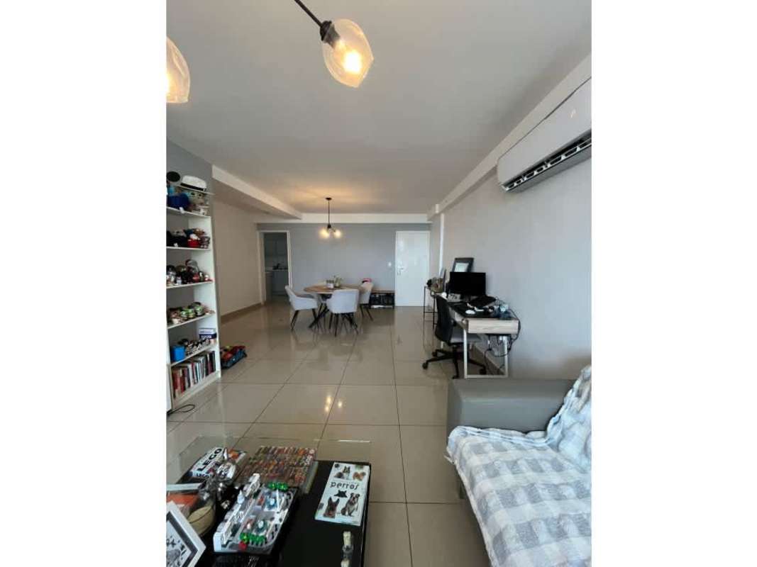 Bedroom with large window and city view in PH San Francisco Bay Panama City