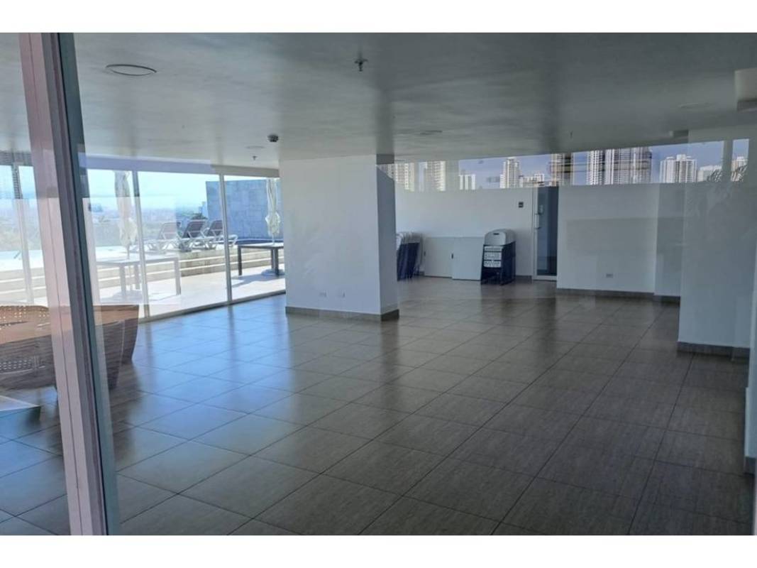 Bright multi-use lounge with glass walls opening onto terrace PH Tee One San Francisco Panama