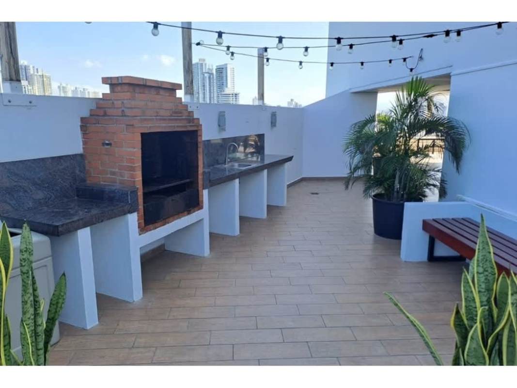 Bedroom with window looking to city, curtains, and AC PH Tee One San Francisco Panama