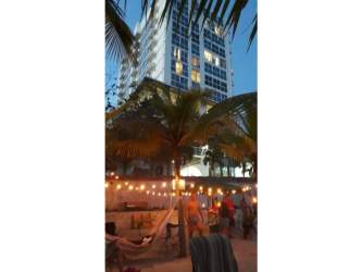 Bedroom with mirrored closet, chandelier, balcony ocean view PH Ibiza Playa Corona Panama