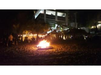 Contemporary living and dining space with panoramic windows Playa Corona condo Panama