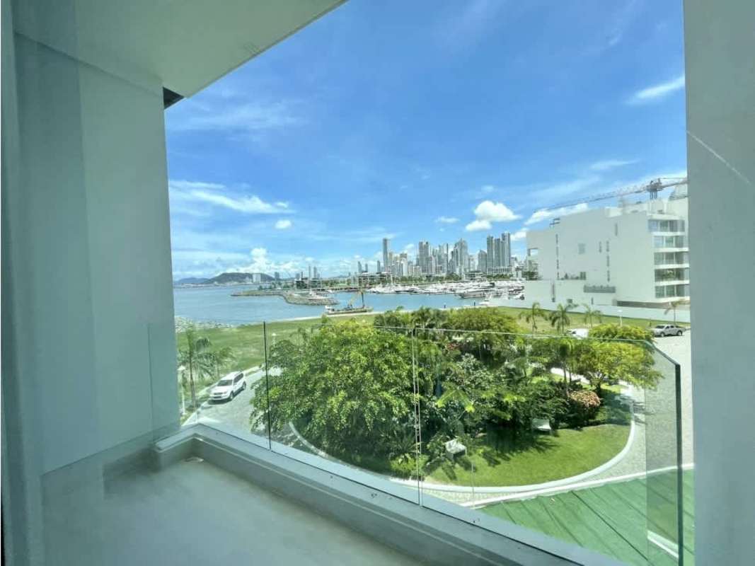 Balcony view of Panama marina and city skyline with glass railings at Ocean Pearl Ocean Reef Panama