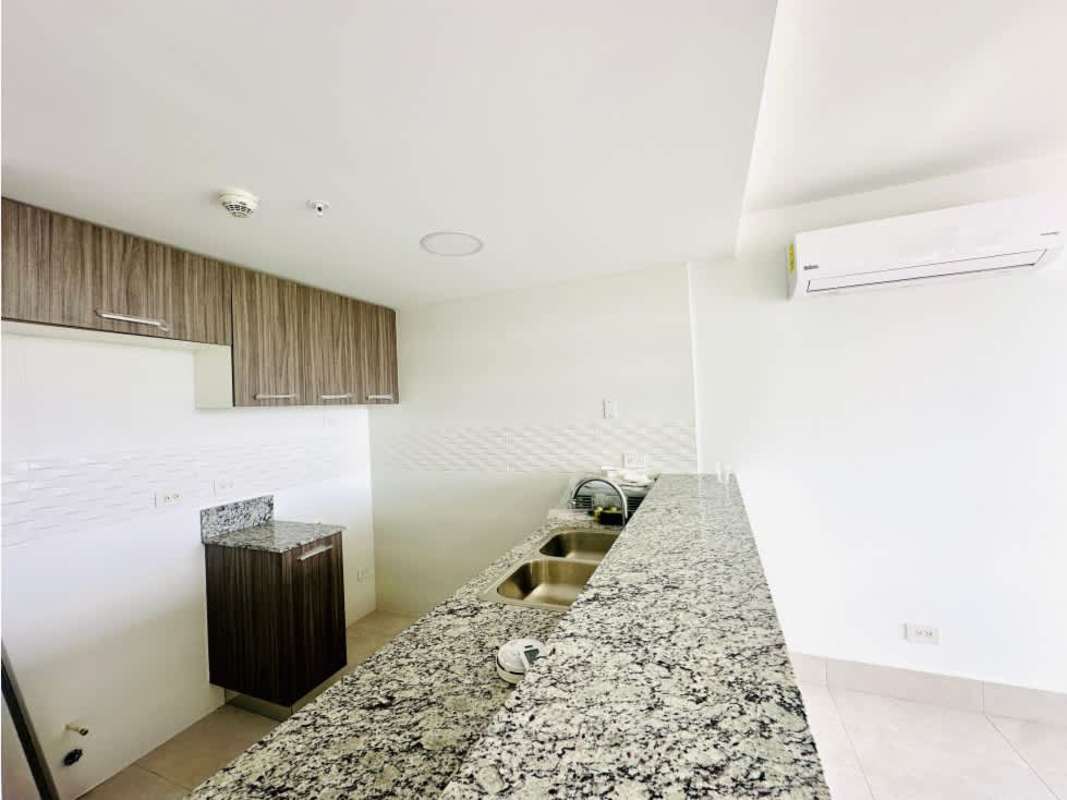 Modern granite kitchen with AC unit and cabinetry Greenwood Towers El Bosque Panama