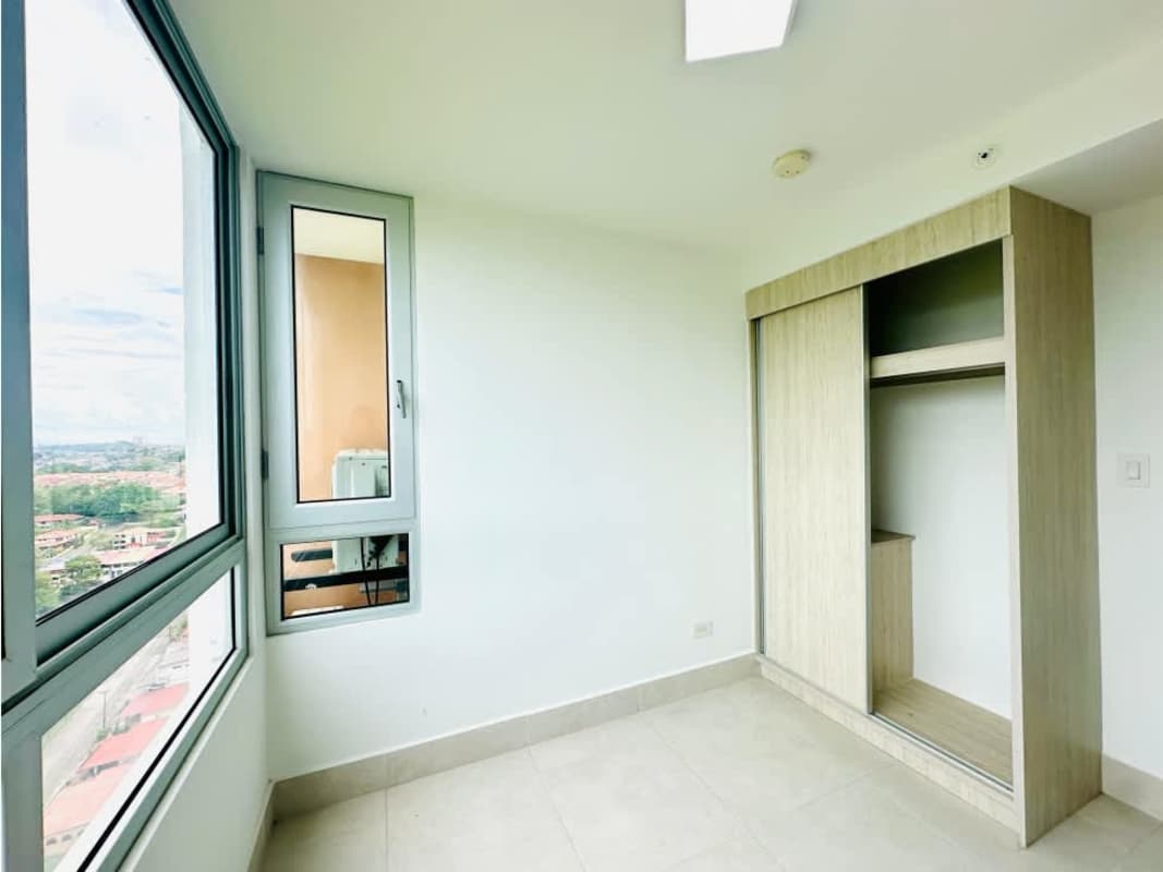 Spacious walk-in closet with built-in shelving at Greenwood Towers Panama City