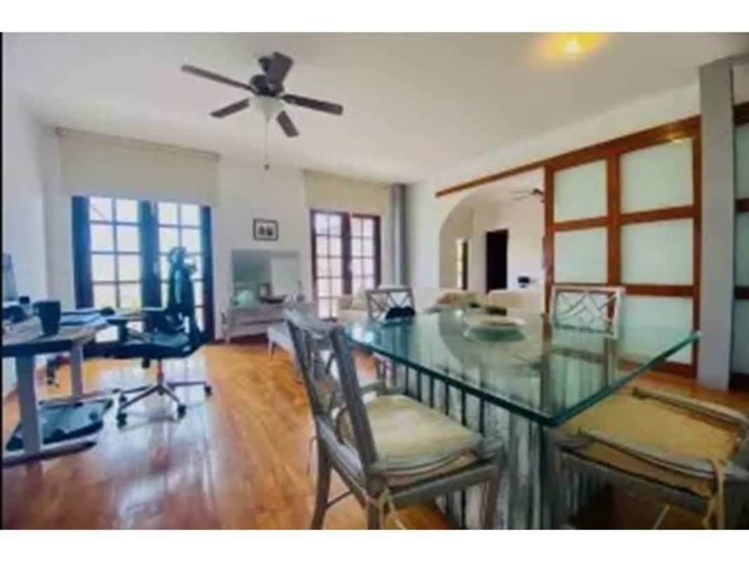 Contemporary kitchen with granite countertops, wood cabinets, stainless appliances in PH Star & Herald Casco Viejo