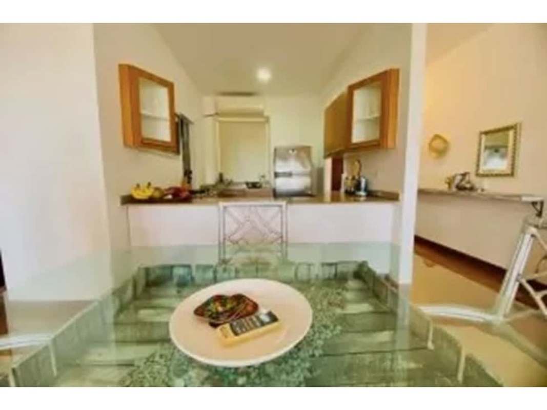 Traditional bathroom with beige tiles, vanity sink, large mirror in PH Star & Herald