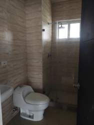 Closed kitchen with tile floor wood cabinetry home for rent Panama Oeste