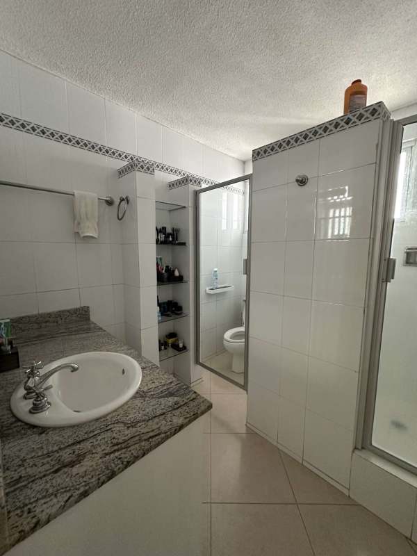 Large kitchen with tile finish in commercial commercial house Obarrio Panama