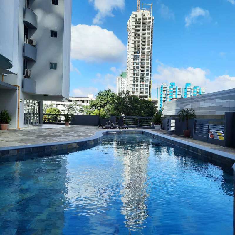 Swimming pool area with lounge, city views in PH Aquazul Bella Vista Panama City