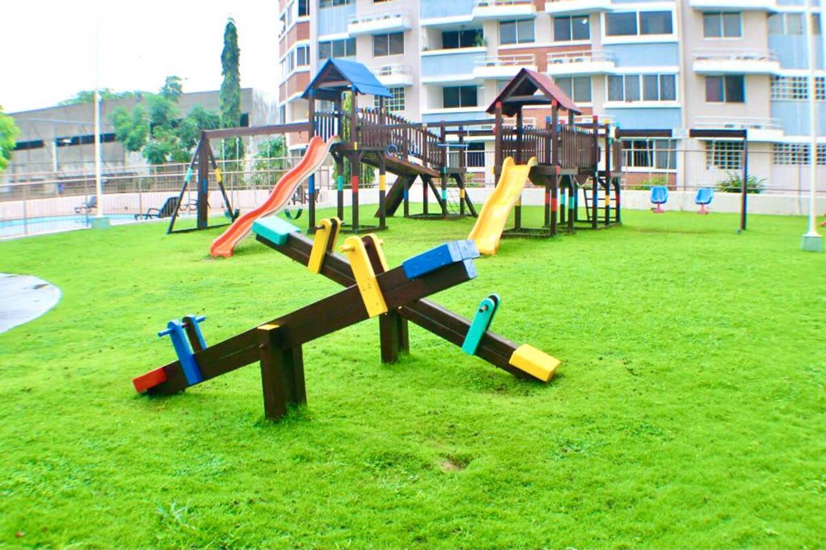 Children's playground with slides and swings in Llano Bonito Gardens Panama City