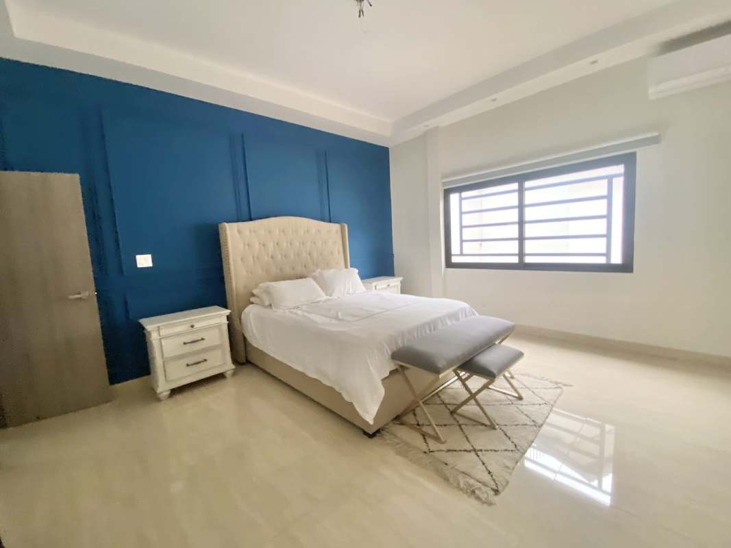 Modern kitchen with granite countertops and stainless steel appliances in remodeled house El Dorado Betania Panama