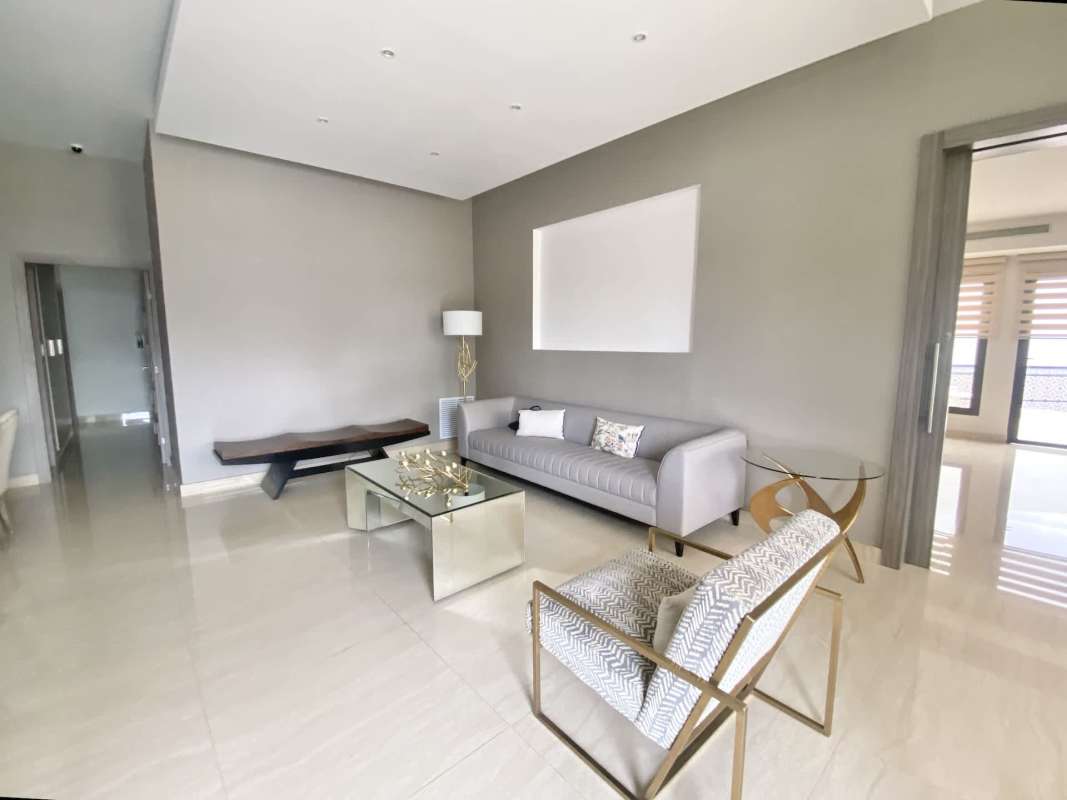 Modern dining room with neutral colors and tile floors in house El Dorado Betania Panama City